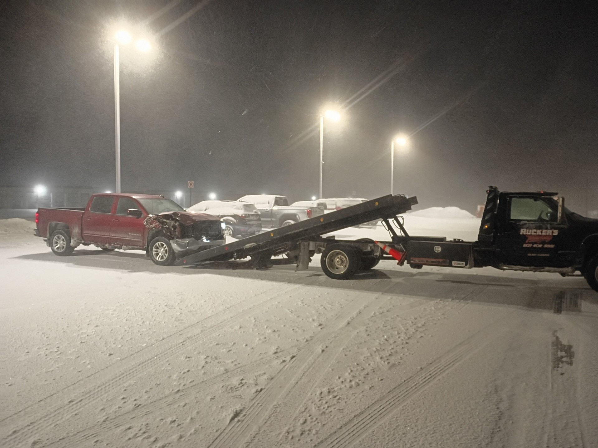 Ruckers Towing winter recovery during a Minnesota snowstorm
